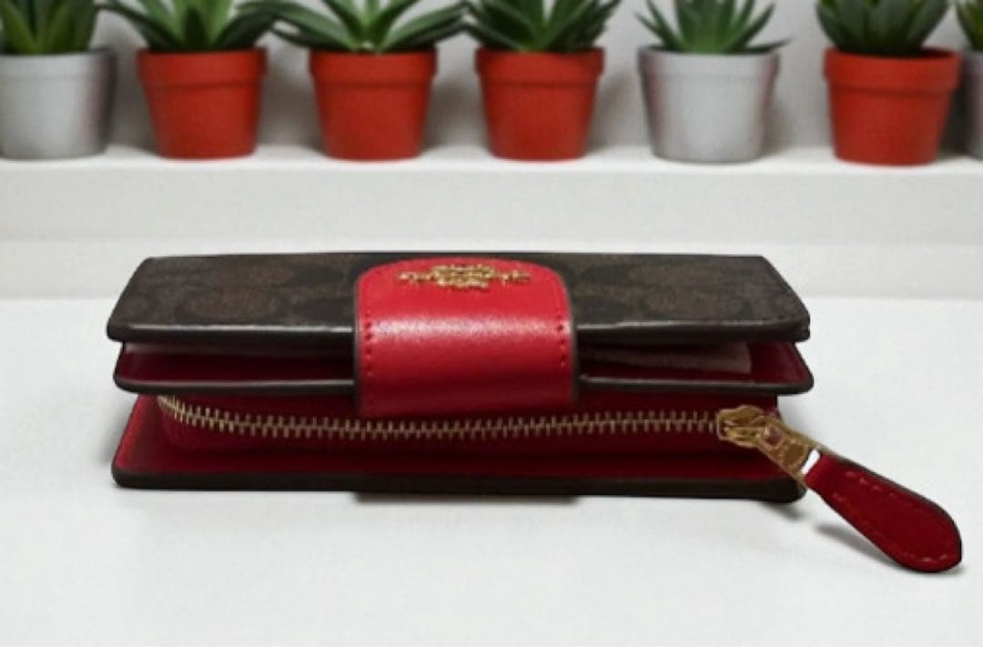 【新品】COACH 二つ折り財布ブラウン/レッドシグネチャー