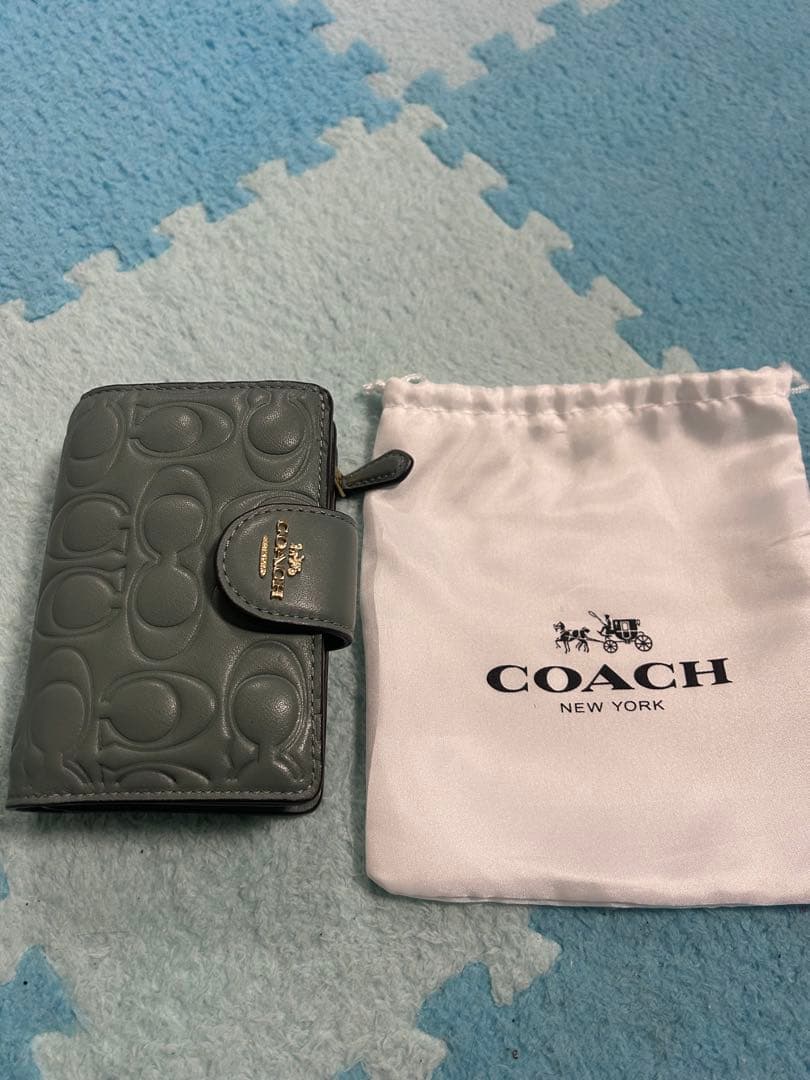 COACH 二つ折り財布 収納袋付き グレーグリーン